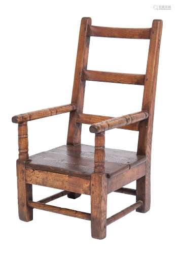 A child's early 19th Century ash, pine and fruitwood ladderback elbow chair:,
