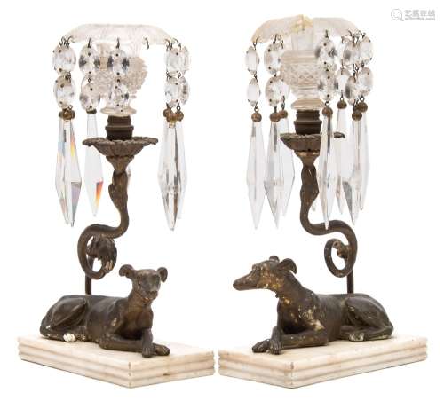 A pair of Regency gilt gesso table lights: each with cut glass petal shaped sconces,
