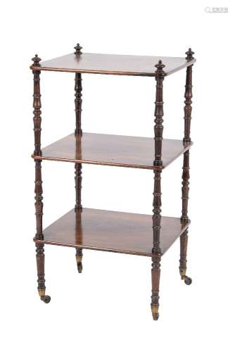 An early 19th Century rosewood three tier whatnot:, with rectangular tops and ring turned uprights,