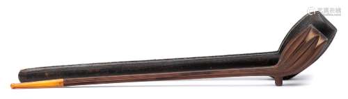 An unusual 19th century carved hardwood pipe: with elongated wood stem and amber mouthpiece,