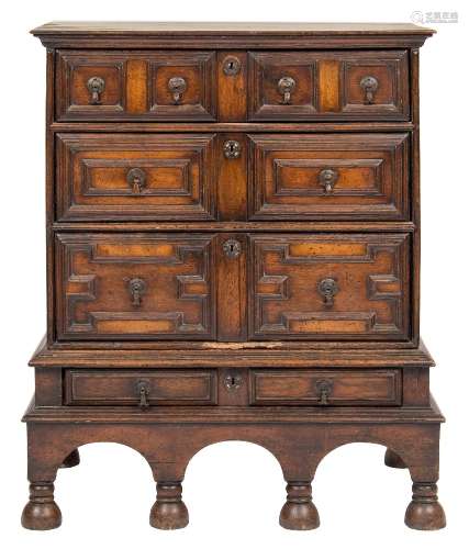 A 17th Century oak chest on stand:,