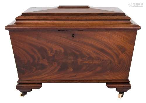 A Victorian mahogany sarcophagus shaped cellarette:, with a hinged top and interior divisions,