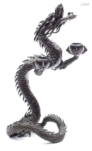 A late 19th century Japanese bronze incense burner: in the form of a rearing dragon,