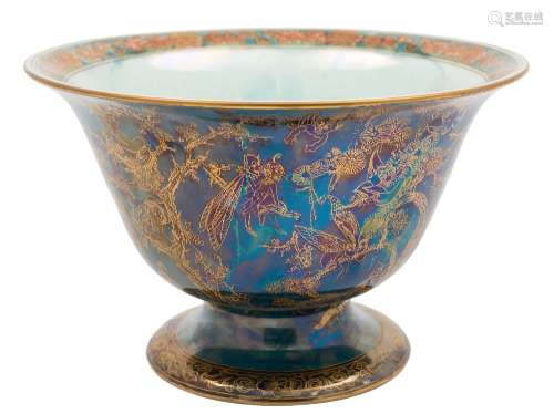 A Wedgwood fairyland lustre pedestal bowl: the exterior decorated with the 'Firbolgs' pattern,