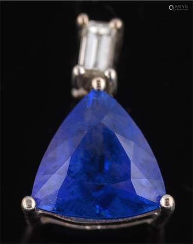 A trillion-cut tanzanite and bagutte-cut diamond two-stone pendant: the trillion-cut tanzanite