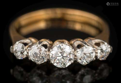 A graduated diamond five-stone ring: with round old brilliant-cut diamonds estimated to weigh a