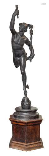 After Giambologna A life size cast metal figure of Mercury: holding a torch in his right hand and a