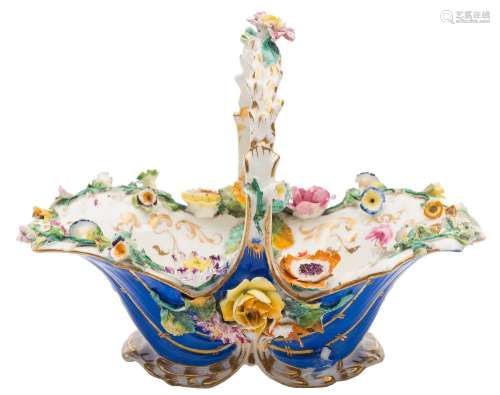 A Coalport porcelain flower basket: of typical rococo form with blue and gilt exterior,