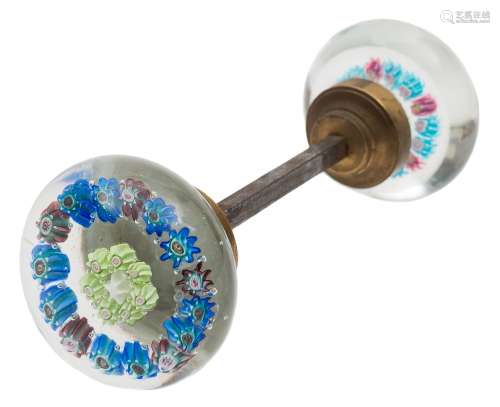 A pair of French glass spaced millefiori door handles: each with two concentric rings of flower