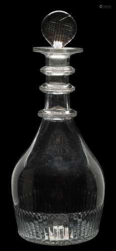 An 18th century sealed glass wine bottle: of squat cylinder form with shallow kick up,