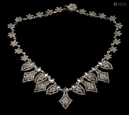 An early 19th century fringe necklace: composed of faceted steel rosette studs interspersed with