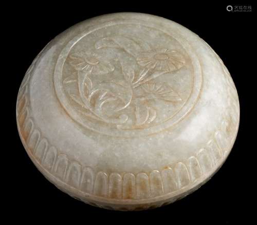 A Chinese Mugal-style jade box and cover: carved with a floral spray and two fluted bands,