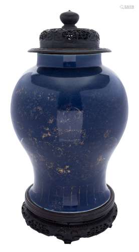 A Chinese blue ground baluster jar: decorated in gilt with flowers and foliage above a lappet band,