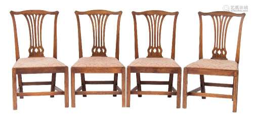 A set of four George III mahogany dining chairs:,