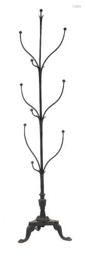 A wrought iron 'tree' hat stand:, with curved branches and stylised leaf decoration,