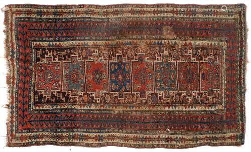 A Shirvan rug:, the field with eight rectangular panels,