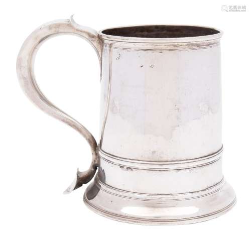 A Queen Anne period silver mug, all marks rubbed and worn: initialled,