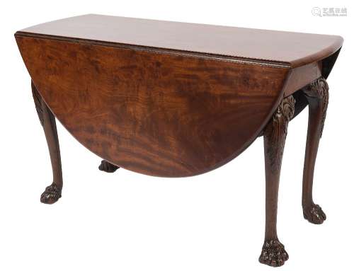 A mid 18th Century mahogany oval drop flap dining table:,