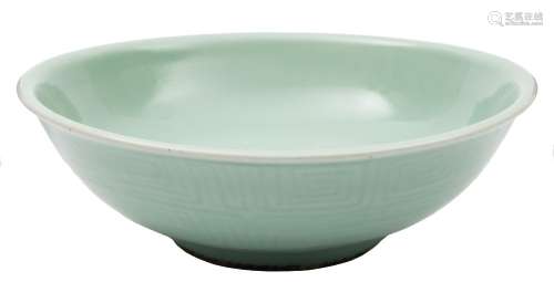 A Chinese celadon bowl: of curved shallow form with everted rim,