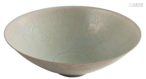 A Chinese Qingbai porcelain bowl: of flared conical form, covered in a pale blue crackled glaze,