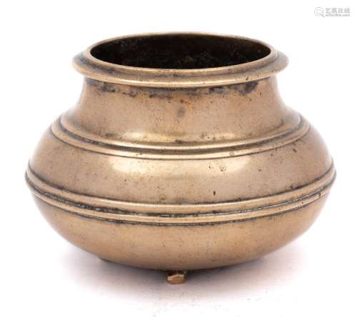 A Chinese polished bronze censer: of baluster form cast with two concentric double ribs to the