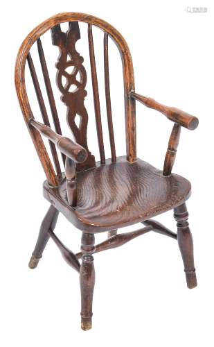 A child's early 19th Century elm and beechwood wheel and stick back Windsor elbow chair:,