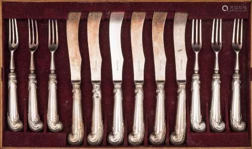 A set of pistol grip knives and forks with unmarked handles: having steel blades and tines,