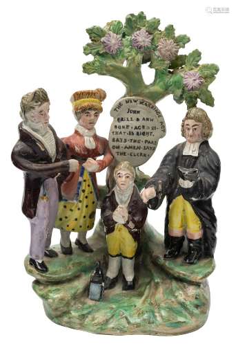 A Staffordshire pearlware 'New Marriage Act' group: of traditional form,