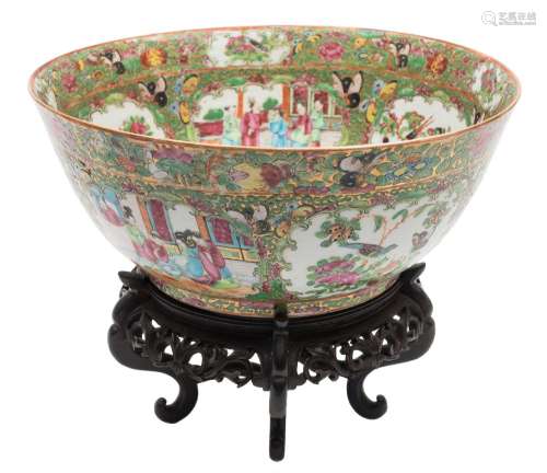 A Canton famille rose punch bowl: painted with panels of birds,