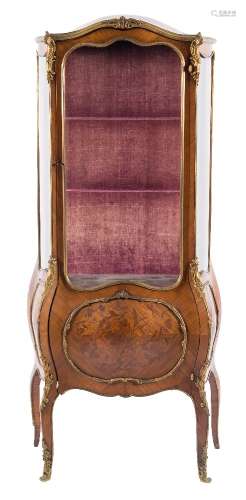 A 19th Century French kingwood, floral marquetry and gilt metal mounted bombe vitrine:,