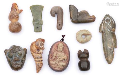 A group of nine various Chinese archaic-style and other carved jade pendants: including a fish,