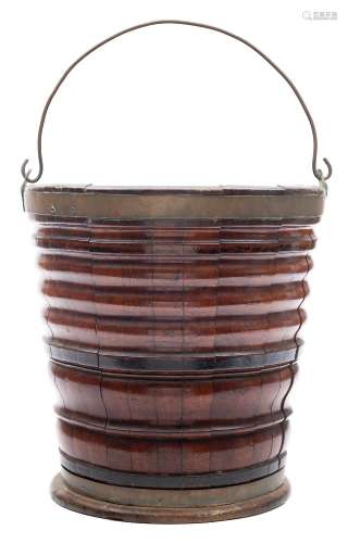 A 19th century Continental mahogany peat bucket: of coopered construction,
