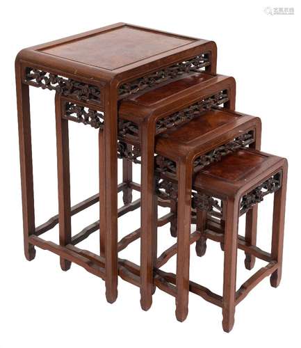 A set of Chinese rosewood and burr elm quartetto tables:, having pierced prunus aprons,