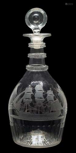 An Irish engraved glass decanter: with triple neck rings and basal comb flutes,