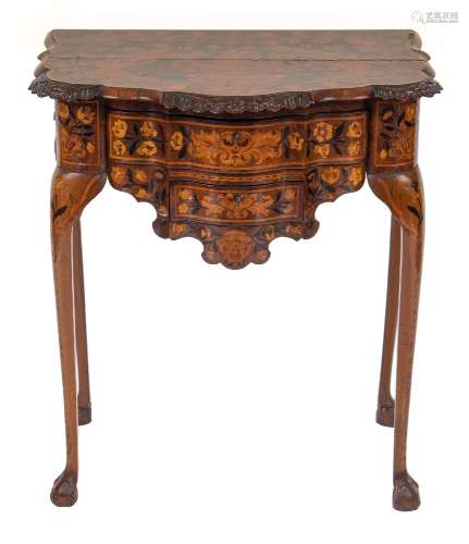 A late 18th/early 19th Century Dutch carved walnut and floral marquetry serpentine fronted side