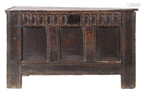 A 17th Century oak rectangular coffer:, with a plain hinged channel moulded top,
