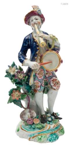 A Bow figure of a musician: wearing a plumed hat, blue jacket and floral breeches,