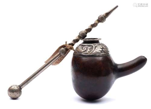 A South American silver mounted gourd bombilla: with silver straining straw, the gourd 10cm.