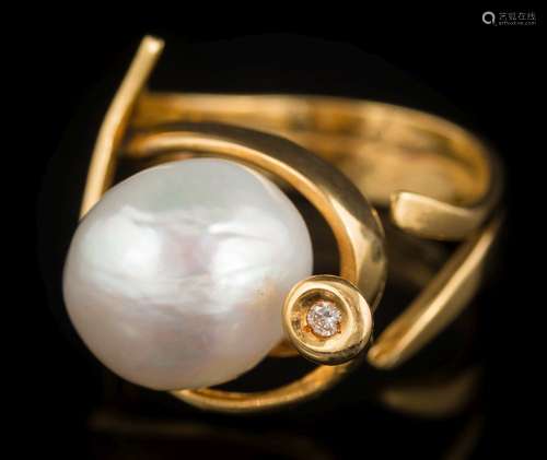 A Portuguese freshwater cultured pearl and diamond set ring: the baroque cultured pearl