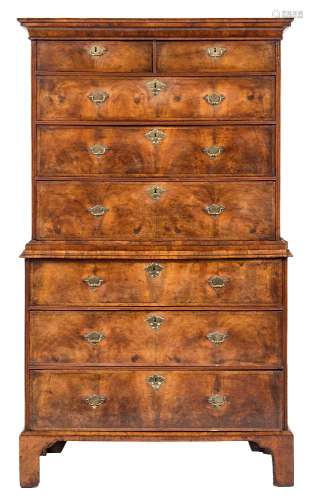 An early 18th Century walnut and crossbanded chest on chest:, the upper part with a moulded cornice,