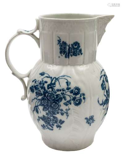 A Caughley blue and white cabbage leaf jug: with mask spout,