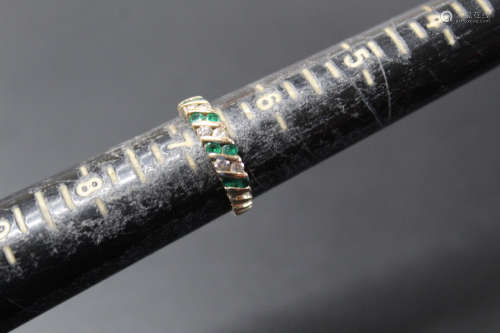 Emerald and diamond 14 K gold ring