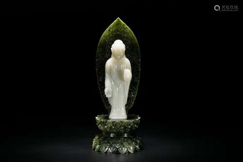 Chinese carved white jade Buddha statue with spinach jade stand.