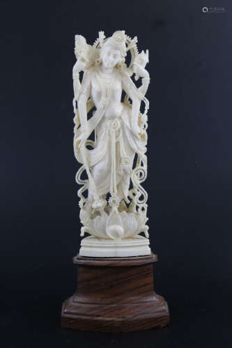 Indian carved bone statue.