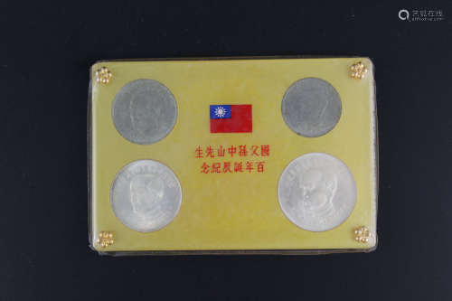 A set of four Chinese silver coins commemorating the centennial birthday of Dr. Sun Yat-Sen.