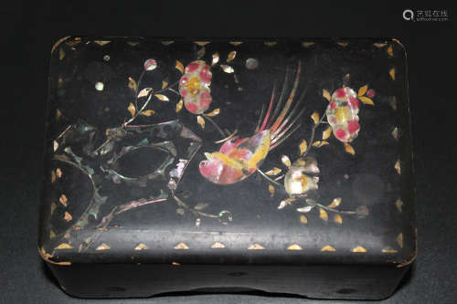 Japanese lacquer box with mother-of-pearl decorations.