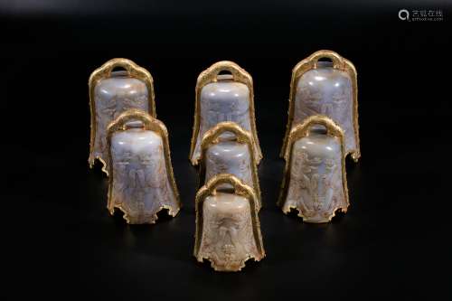 A set of seven Chinese mounted jade bells.