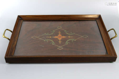 Wood tea tray with glass top and brass handles.