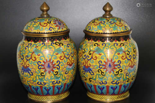 A pair of Chinese cloisonne lidded jars.