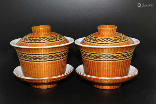 Pair of Chinese porcelain teacups and holders.